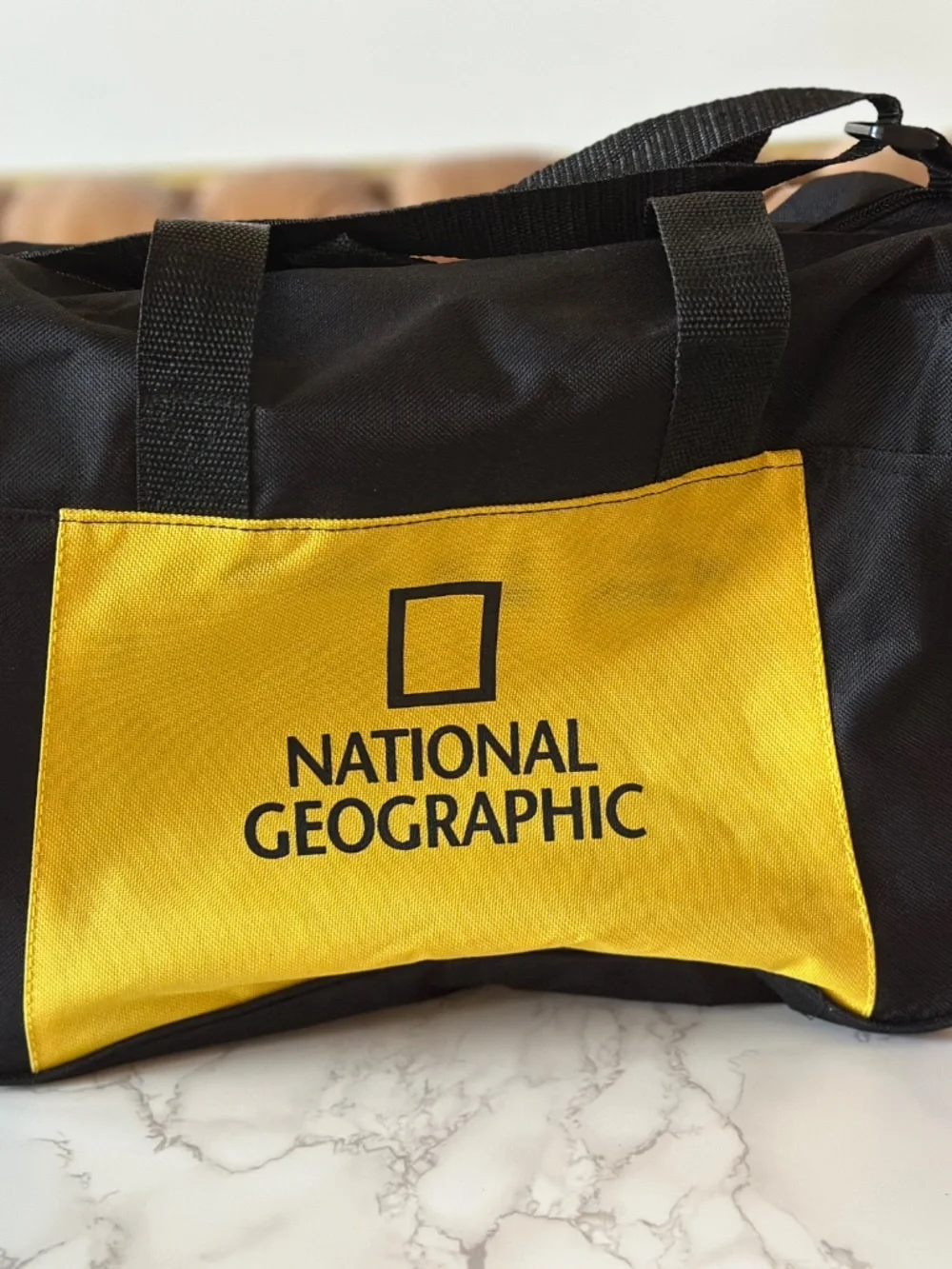 National Geographic · Mini Duffle Bag (yellow/black) 13.75